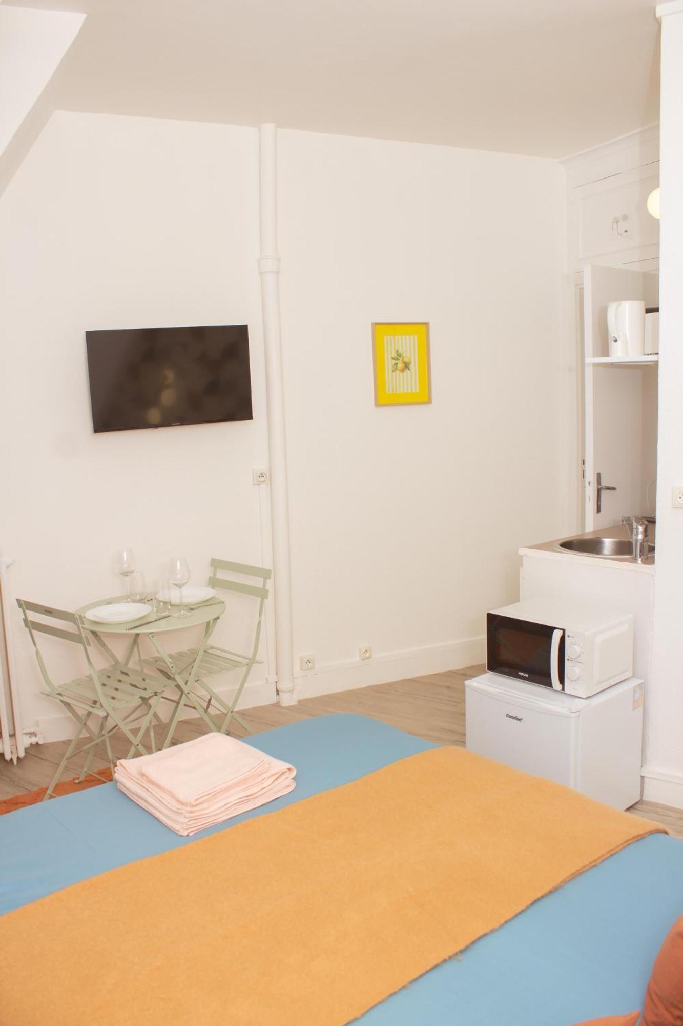 Place Equipe Au Coeur De Avec Vue Sur L'arc De Triomphe Et La Tour Eiffel Accommodatie bij particulieren *